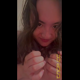 Emi stands over a toilet with her back to the camera and pushes out a pile of hard turds, then shows them off and rubs them on her boobs while smiling for the camera. She drops them in the toilet at the end. Vertical format video. Over 10 minutes.